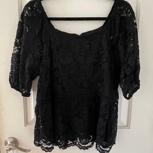 Black, lined, lace blouse with balloon sleeves. Size L, by Nanette Lepore. NWOT